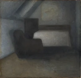 Dachzimmer mit Tisch und Stuhl