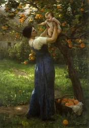 Mutter und Kind in einem Orangenhain