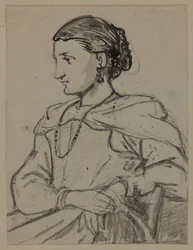 Sitzende Frauenfigur