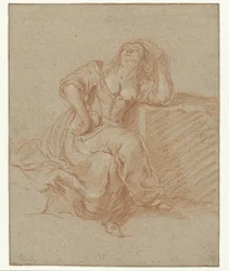 Sitzende Frau in lasziver Pose