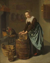 Frau, die ein Gefäß scheuert