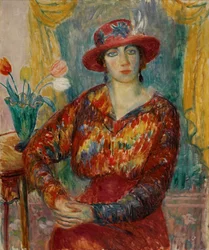 Frau in roter Bluse mit Tulpen