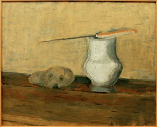 Weißer Krug mit Kartoffeln