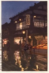 Die Kagurazaka-Straße bei Nacht, nach dem Regen